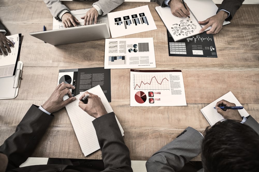 Brainstorm against business interface with graphs and data Brainstorm against business interface with graphs and data